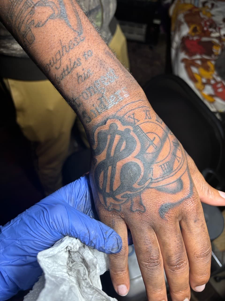 Black-work + Lettering dollar sign tattoo on Hand by TattedbyJayden on TattMe
