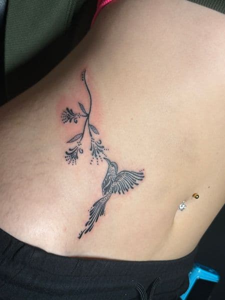 Fine Line + Black-work hummingbird tattoo on Ribs by TattedbyJayden on TattMe