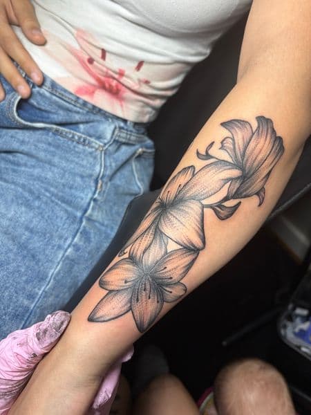 Black & Grey + Illustrative flowers tattoo on Forearm by TattedbyJayden on TattMe