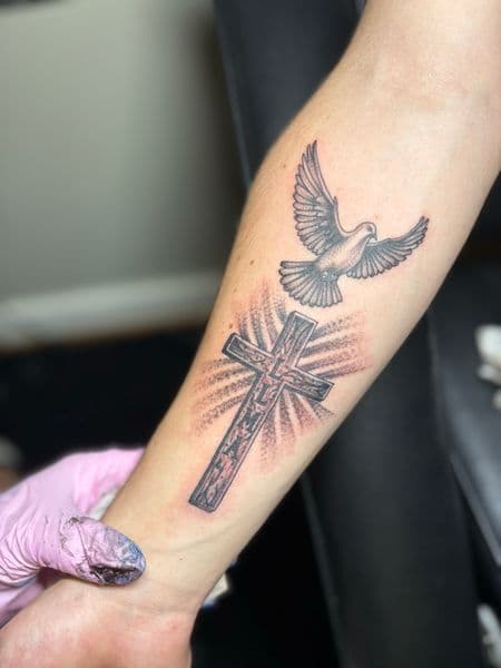 Black & Grey + Religious cross tattoo on Forearm by TattedbyJayden on TattMe