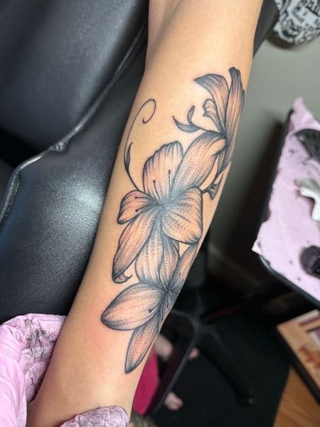 Black & Grey + Floral flowers tattoo on Forearm by TattedbyJayden on TattMe