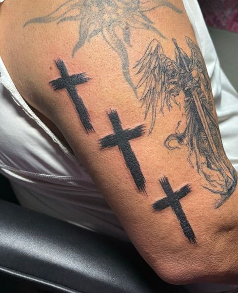 Black-work + Line-work crosses tattoo on Upper Arm by TattedbyJayden on TattMe