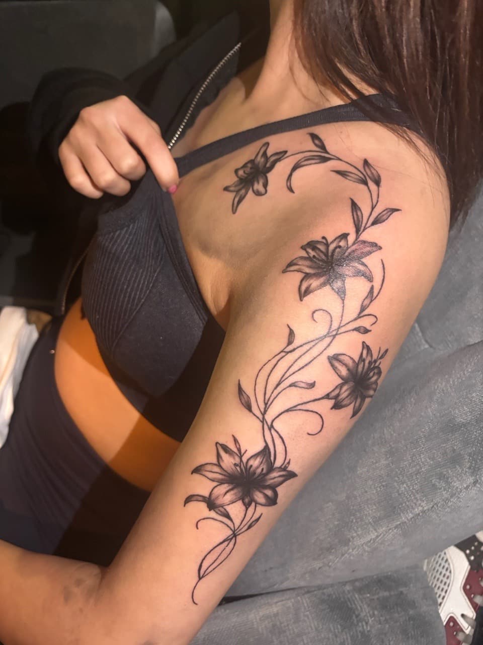 Floral + Black & Grey lilies tattoo on Upper Arm by TattedbyJayden on TattMe