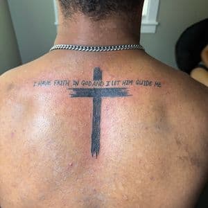 Black-work + Lettering cross tattoo on Upper Back by TattedbyJayden on TattMe