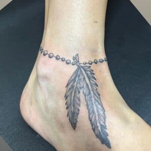 Black & Grey + Fine Line feathers tattoo on Ankle by TattedbyJayden on TattMe