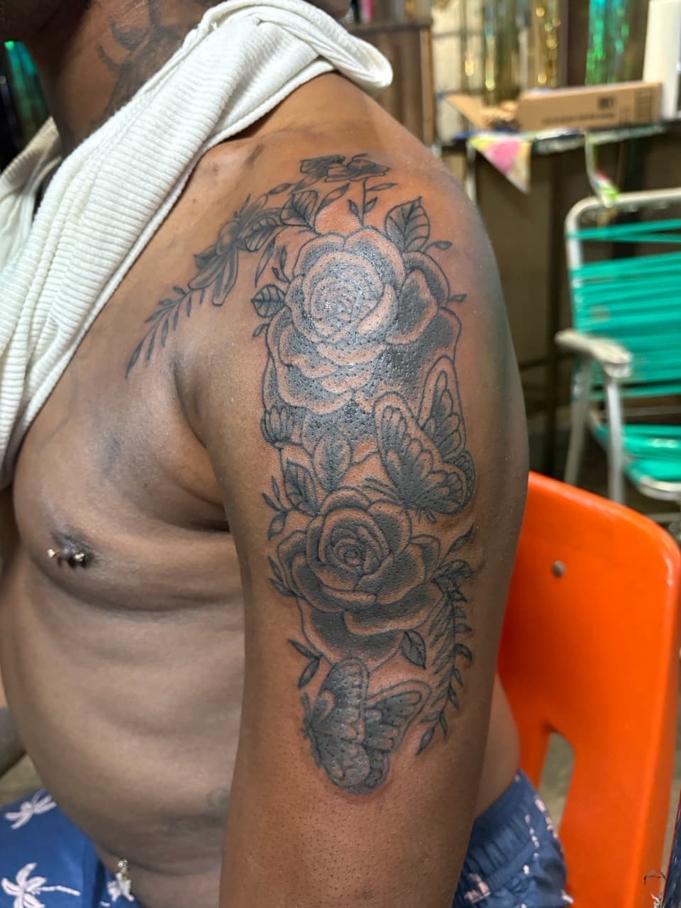 Black & Grey + Floral roses tattoo on Upper Arm by TattedbyJayden on TattMe