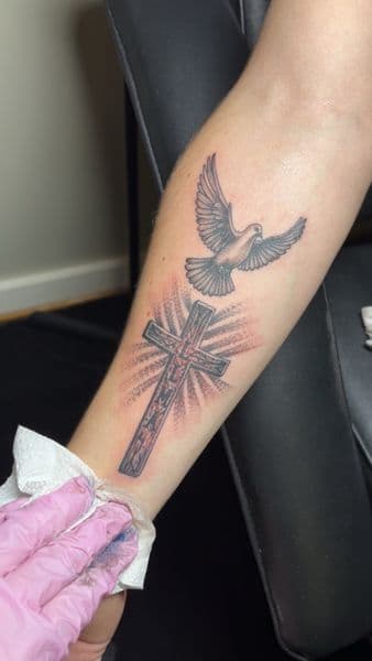 Black & Grey + Illustrative cross tattoo on Forearm by TattedbyJayden on TattMe