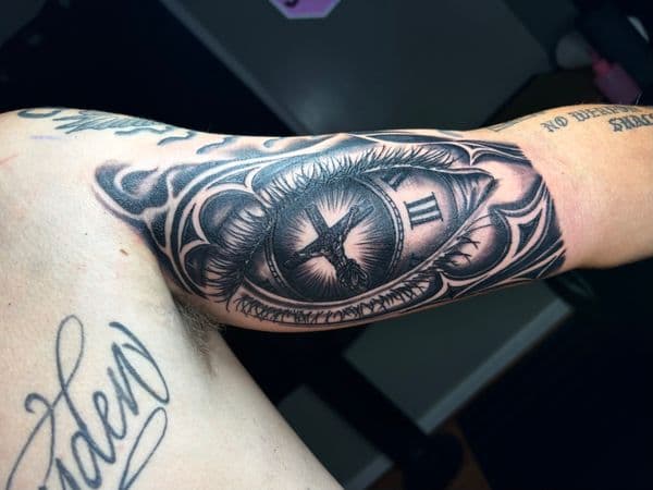 Black & Grey + Realism eye tattoo on Upper Arm by TattedbyJayden on TattMe