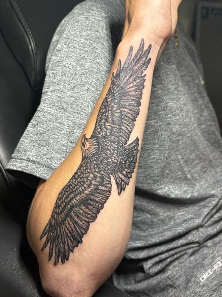 Black & Grey + Illustrative eagle tattoo on Forearm by TattedbyJayden on TattMe
