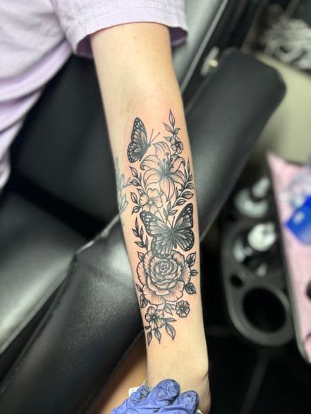 Black & Grey + Illustrative butterflies tattoo on Forearm by TattedbyJayden on TattMe