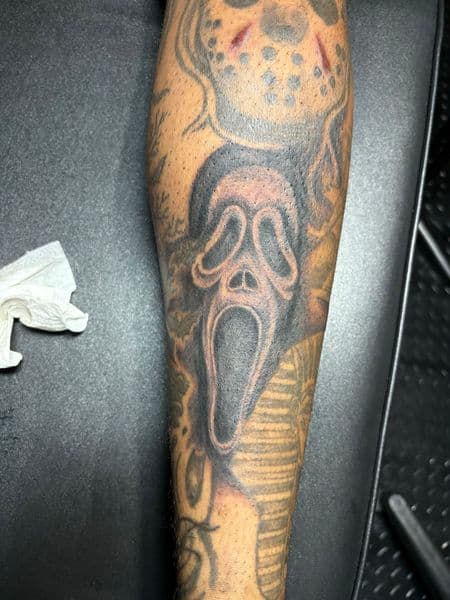 Black & Grey + Illustrative ghost face tattoo on Calf by TattedbyJayden on TattMe