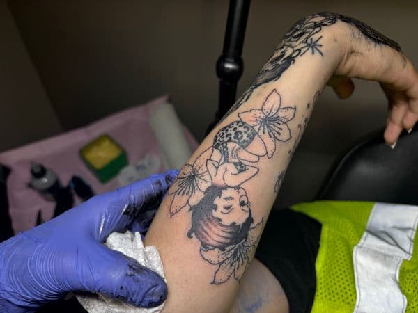 Illustrative + Black & Grey cartoon character tattoo on Forearm by TattedbyJayden on TattMe