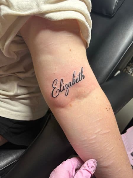 Lettering + Script elizabeth tattoo on Forearm by TattedbyJayden on TattMe
