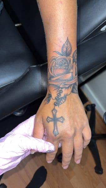 Black & Grey + Illustrative Realism rose tattoo on Wrist by TattedbyJayden on TattMe