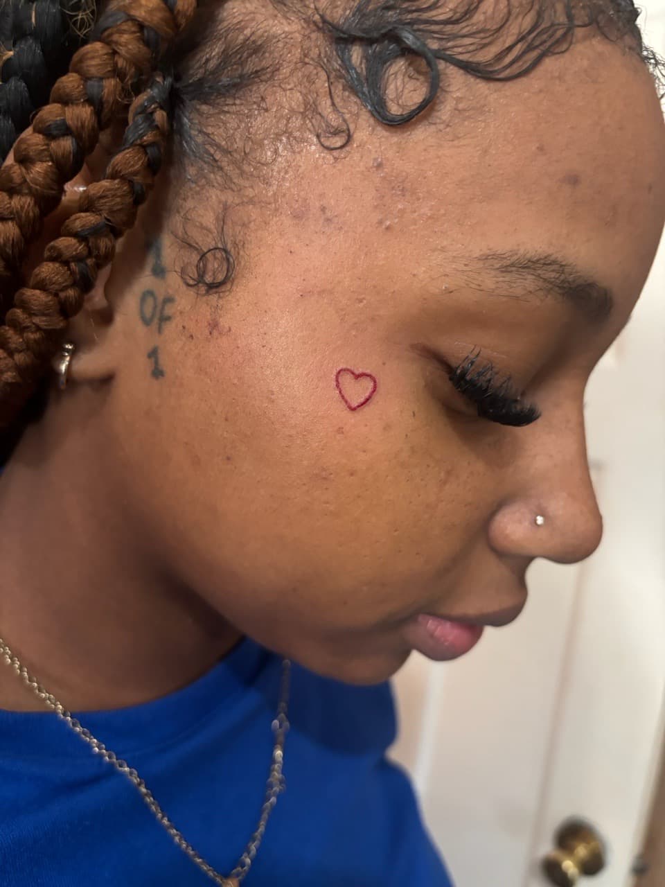 Fine Line + Minimalist heart tattoo on Face by TattedbyJayden on TattMe