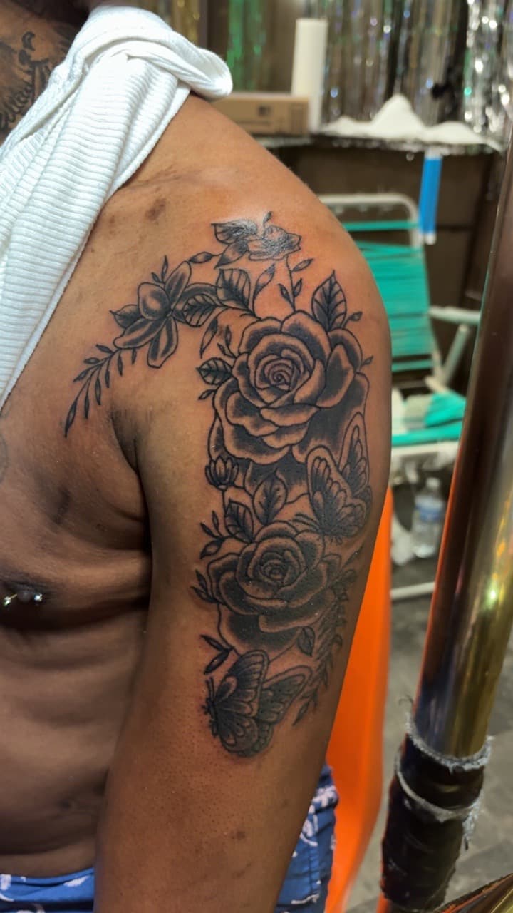 Black & Grey + Floral roses tattoo on Shoulder by TattedbyJayden on TattMe