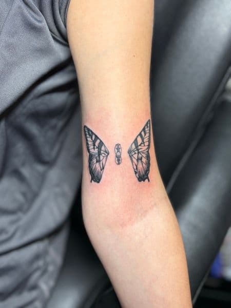 Black & Grey + Illustrative butterfly tattoo on Upper Arm by TattedbyJayden on TattMe