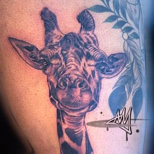Realism + Black & Grey giraffe tattoo on Thigh by Ayem.ink on TattMe