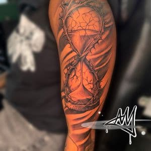 Realism + Black & Grey time hourglass thorns tattoo on Upper Arm by Ayem.ink on TattMe