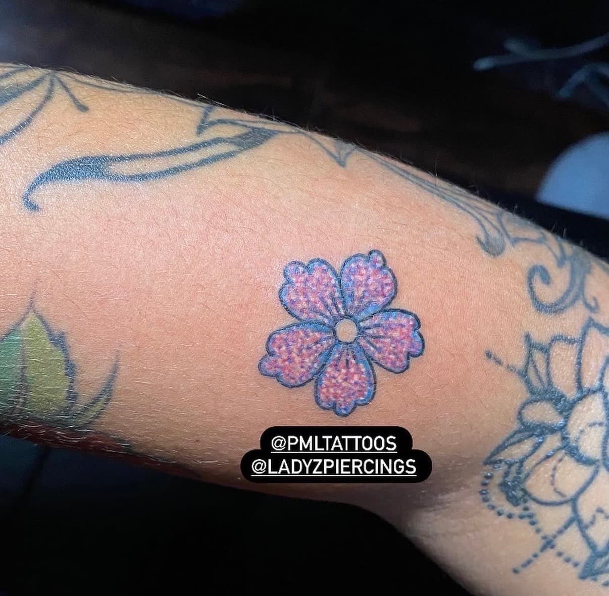 Color + Floral flower tattoo on Forearm by Ladyzpiercings on TattMe