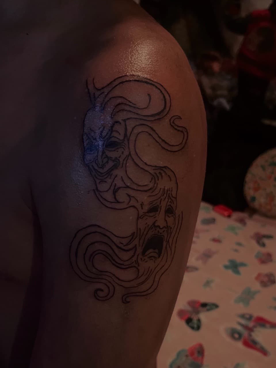 Line-work + Illustrative masks tattoo on Upper Arm by tatsbyautumn on TattMe