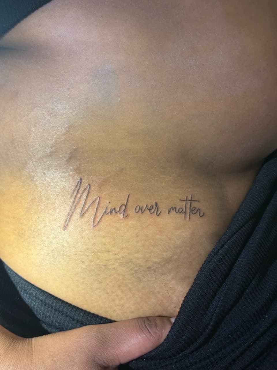 Fine Line + Lettering mind over matter tattoo on Ribs by g4.inkz on TattMe