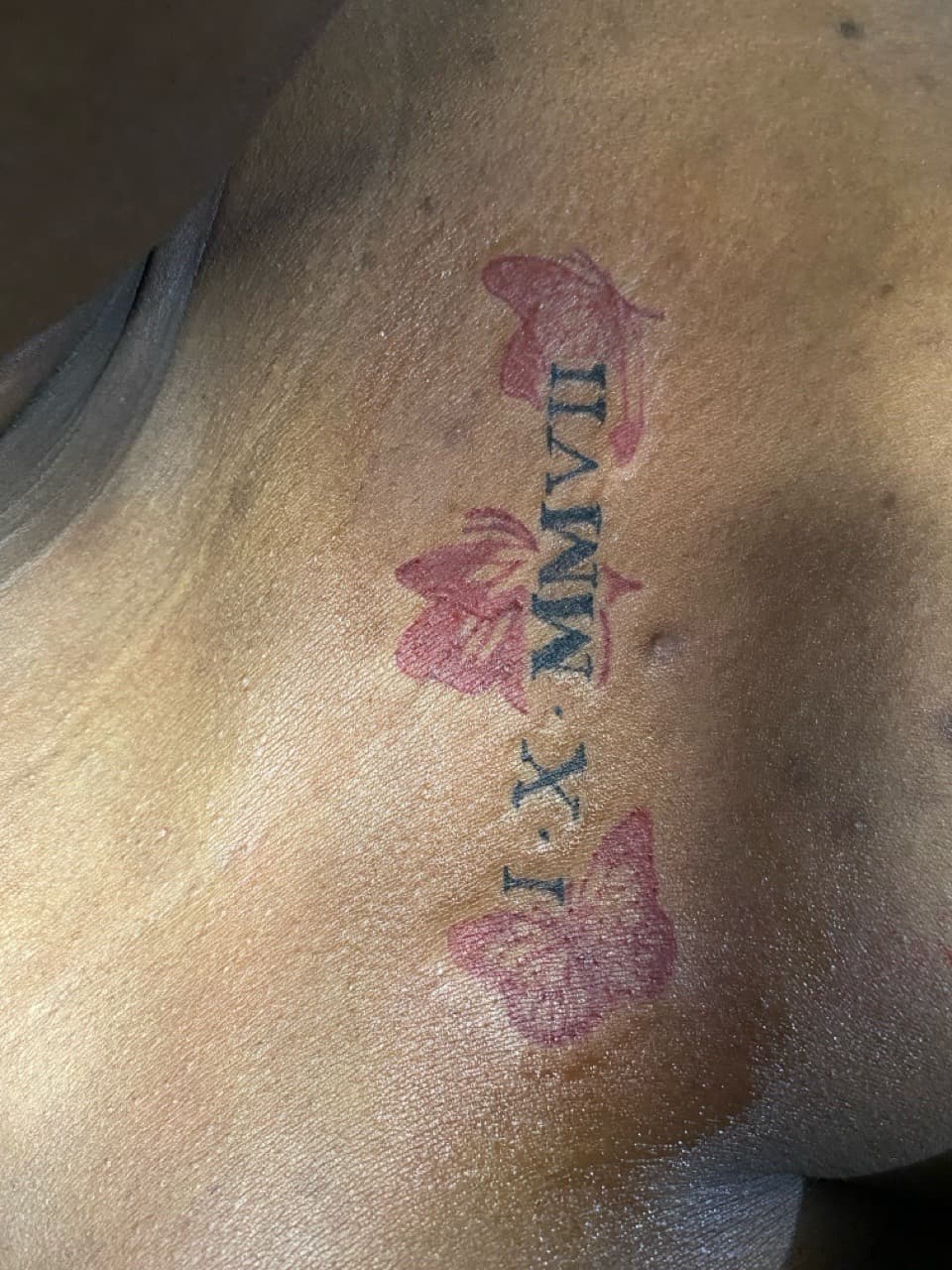 Lettering + Script roman numerals tattoo on Upper Back by Braedan_Sterling on TattMe