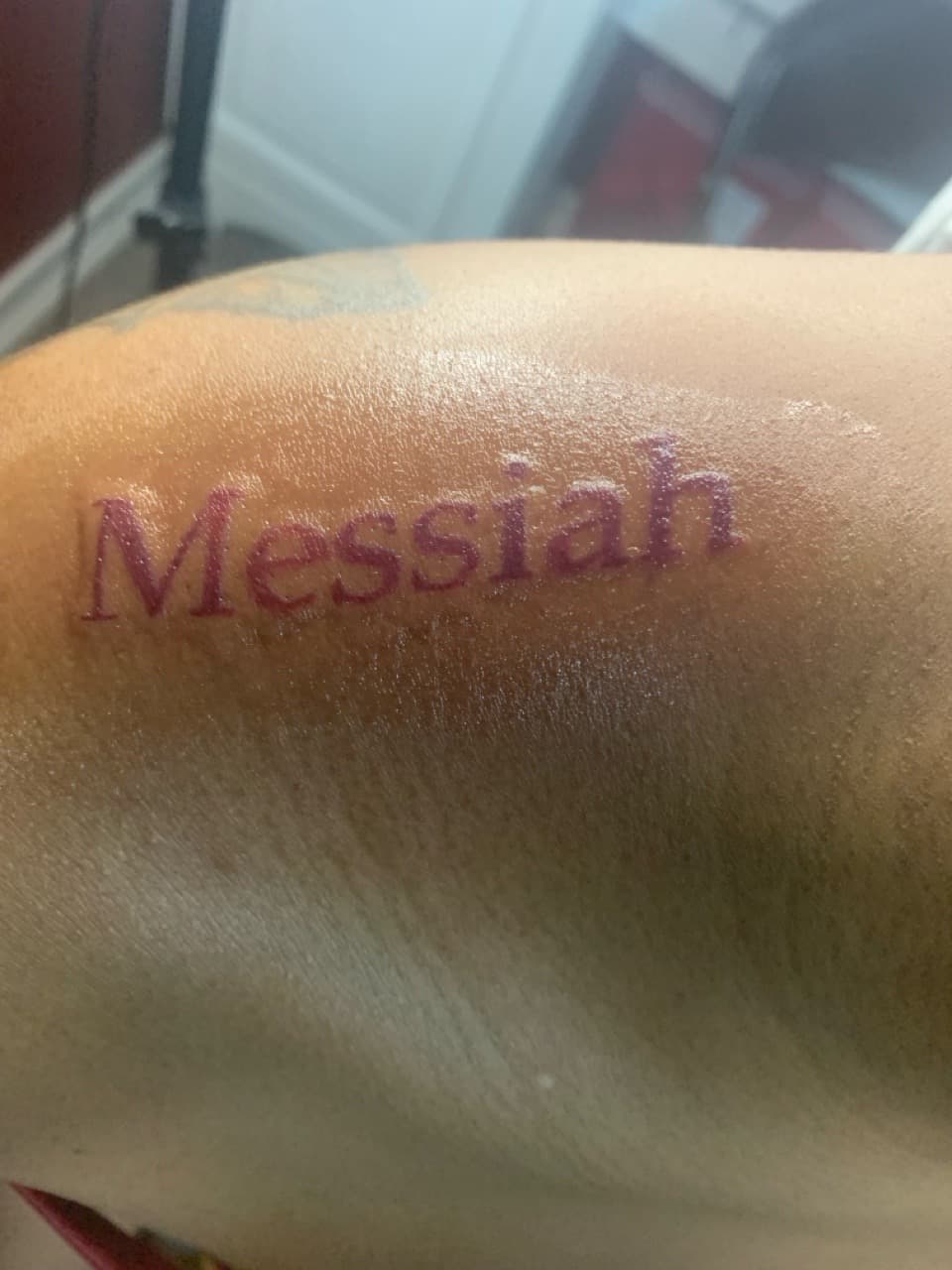 Lettering + Script messiah tattoo on Upper Arm by Braedan_Sterling on TattMe
