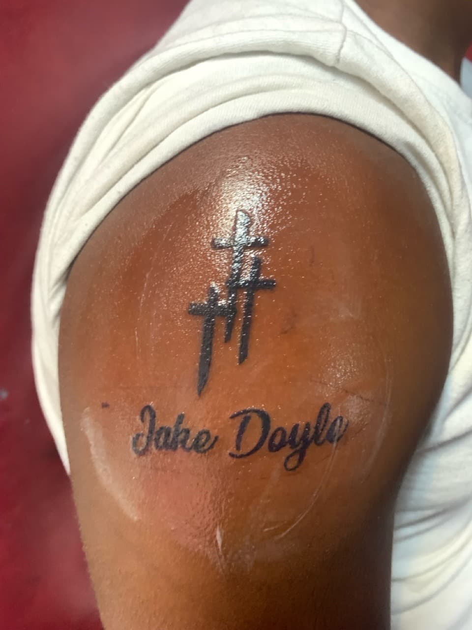 Lettering + Script crosses tattoo on Upper Arm by Braedan_Sterling on TattMe