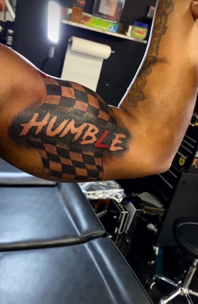 Lettering + Black & Grey checkered flag tattoo on Upper Arm by Fishscale_Images on TattMe