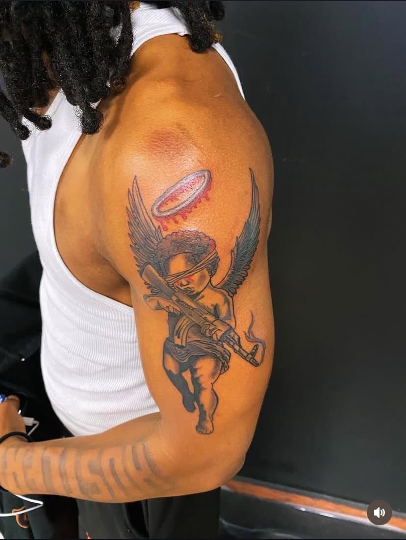Black & Grey + Illustrative angel tattoo on Upper Arm by Fishscale_Images on TattMe