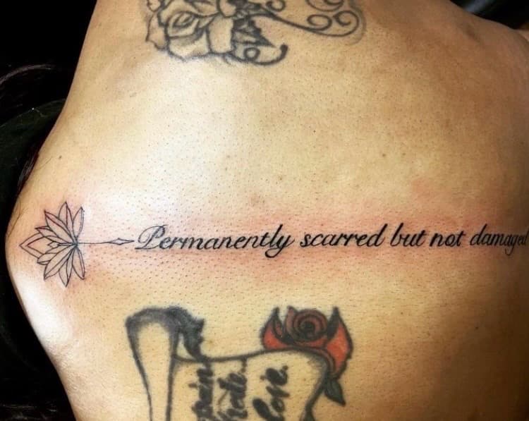 Fine Line + Lettering lotus tattoo on Ribs by Fishscale_Images on TattMe