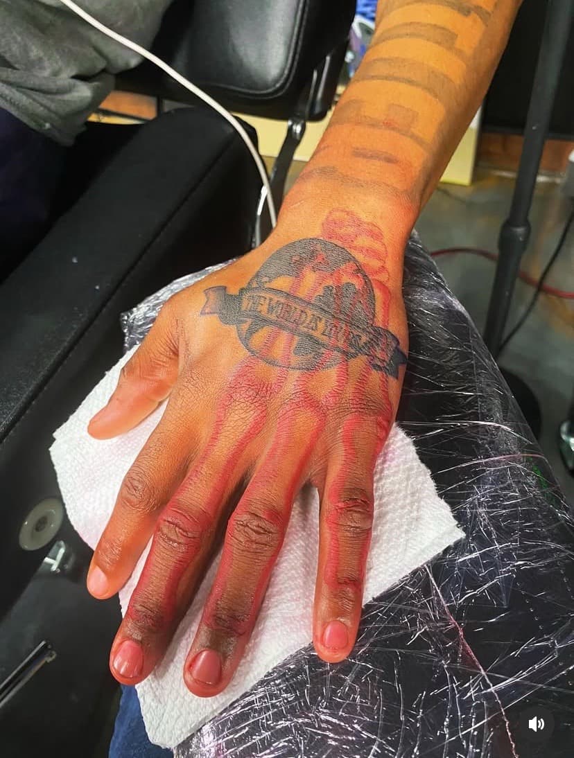 Black & Grey + Lettering globe tattoo on Hand by Fishscale_Images on TattMe