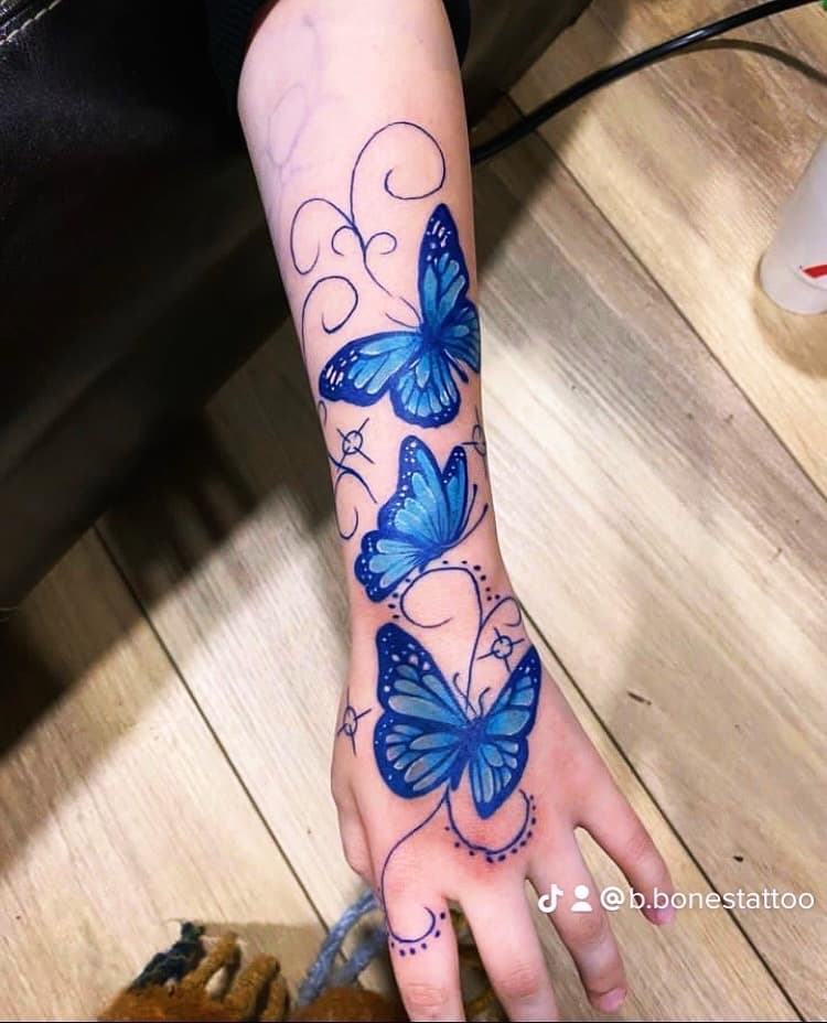 Color + Illustrative butterflies tattoo on Forearm by Fishscale_Images on TattMe
