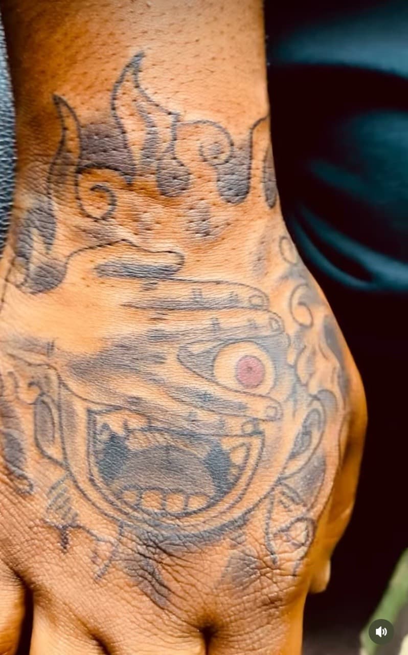 Black & Grey + Illustrative face tattoo on Hand by Fishscale_Images on TattMe