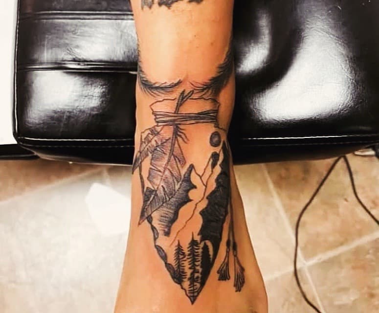 Black & Grey + Illustrative arrowhead tattoo on Ankle by Fishscale_Images on TattMe
