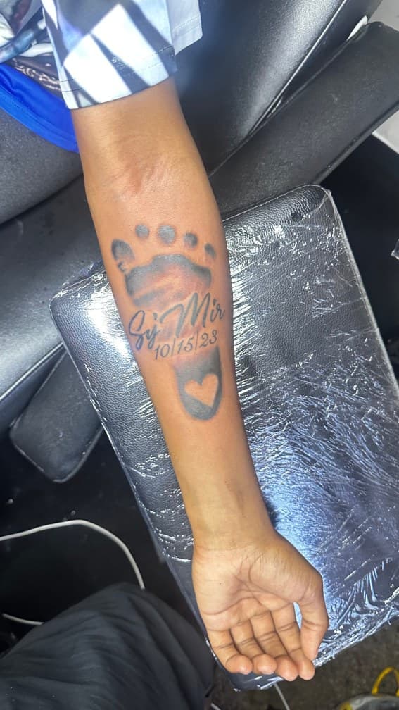 Black & Grey + Lettering baby footprint tattoo on Forearm by CorieTheArtist on TattMe