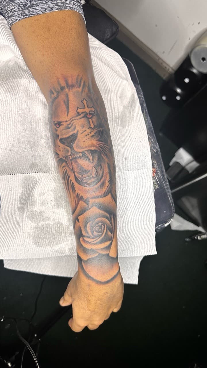 Black & Grey + Illustrative lion tattoo on Forearm by CorieTheArtist on TattMe