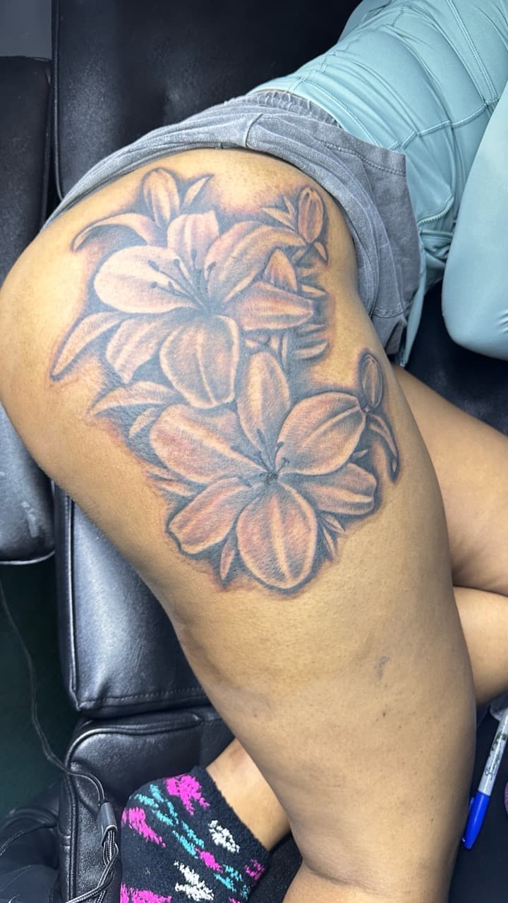 Floral + Black & Grey flowers tattoo on Thigh by CorieTheArtist on TattMe