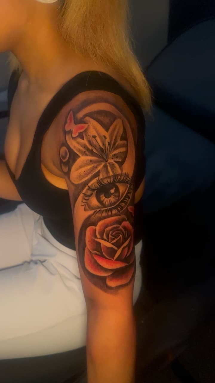 Illustrative + Floral eye tattoo on Half Sleeve by CorieTheArtist on TattMe