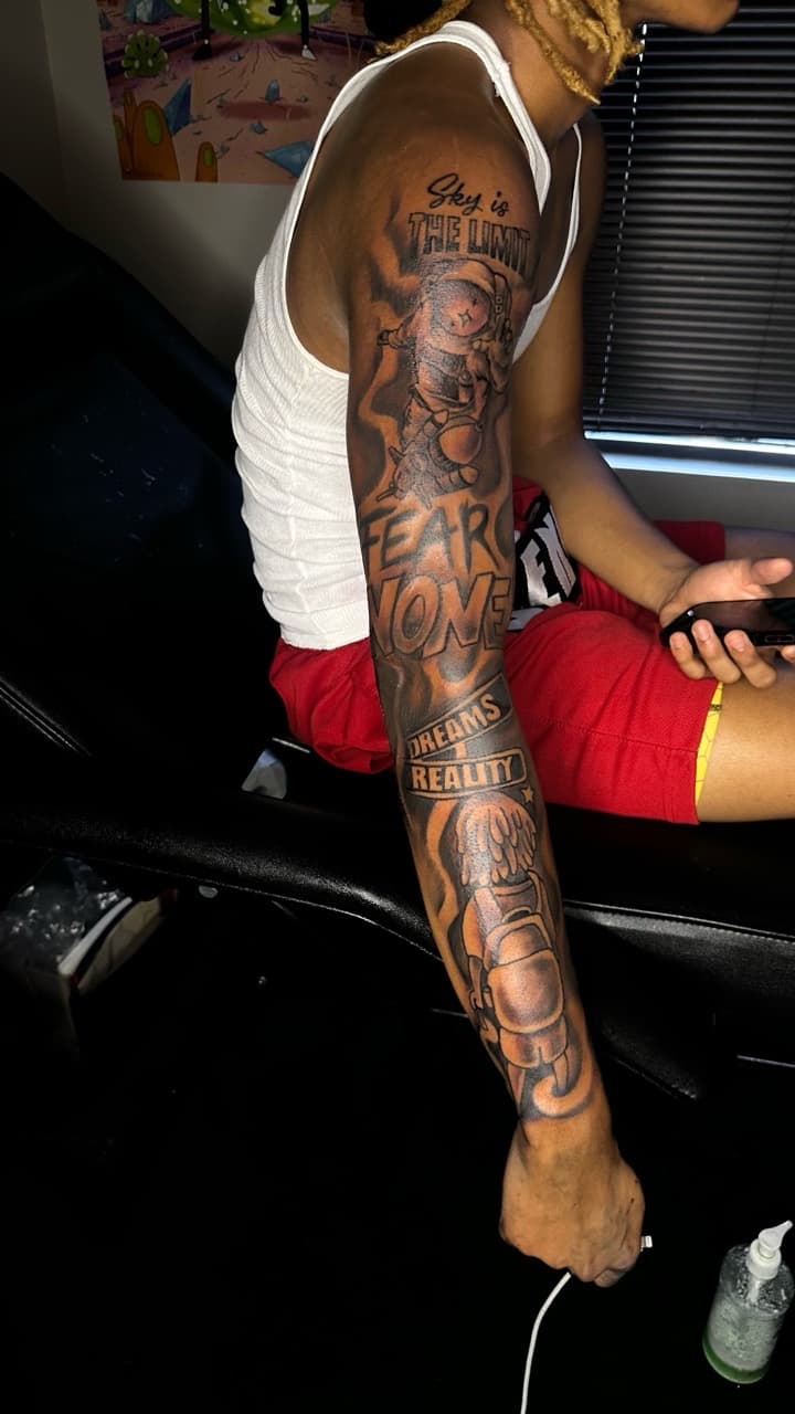 Black & Grey + Lettering astronaut tattoo on Full Sleeve by CorieTheArtist on TattMe