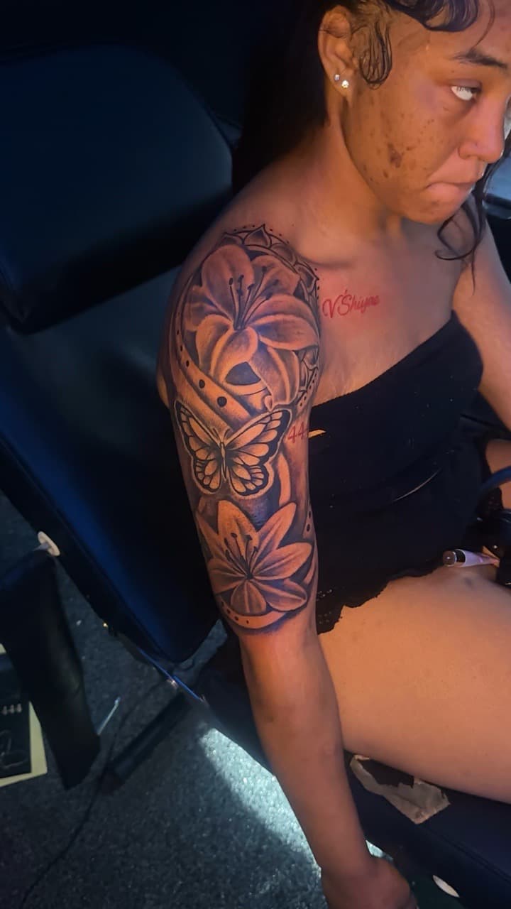 Black & Grey + Floral flowers tattoo on Upper Arm by CorieTheArtist on TattMe