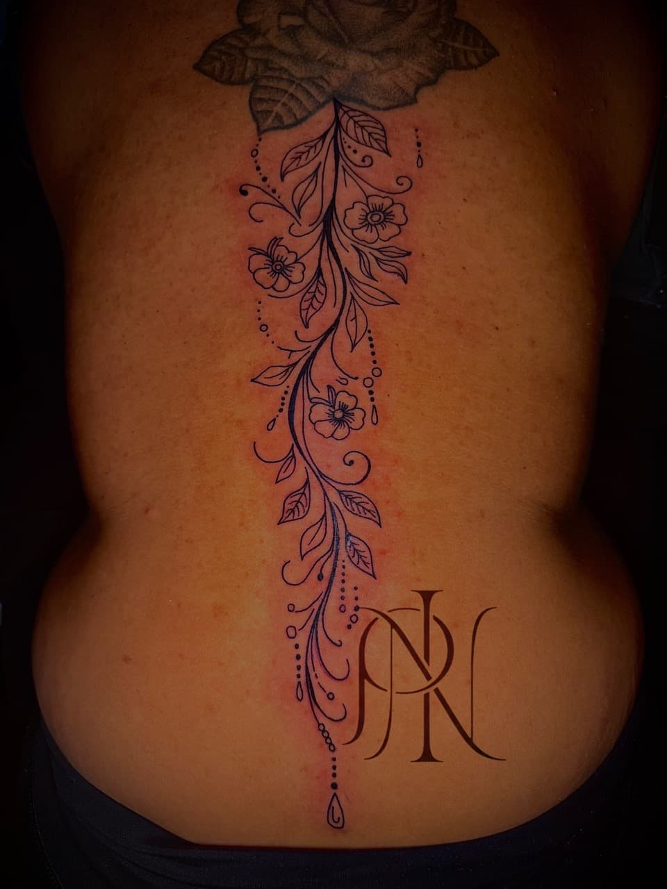 Fine Line + Floral flowers tattoo on Spine by Inkd_Up_PMitch on TattMe