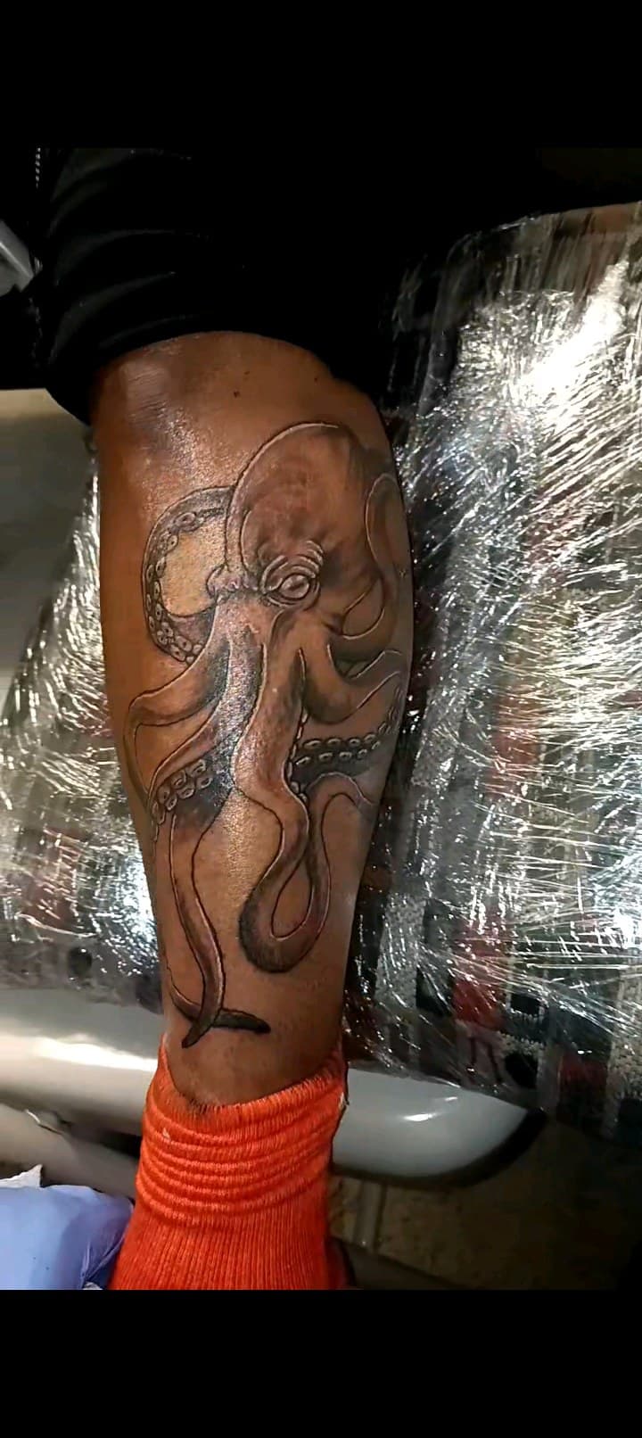 Black & Grey + Illustrative octopus tattoo on Calf by TattmanW on TattMe