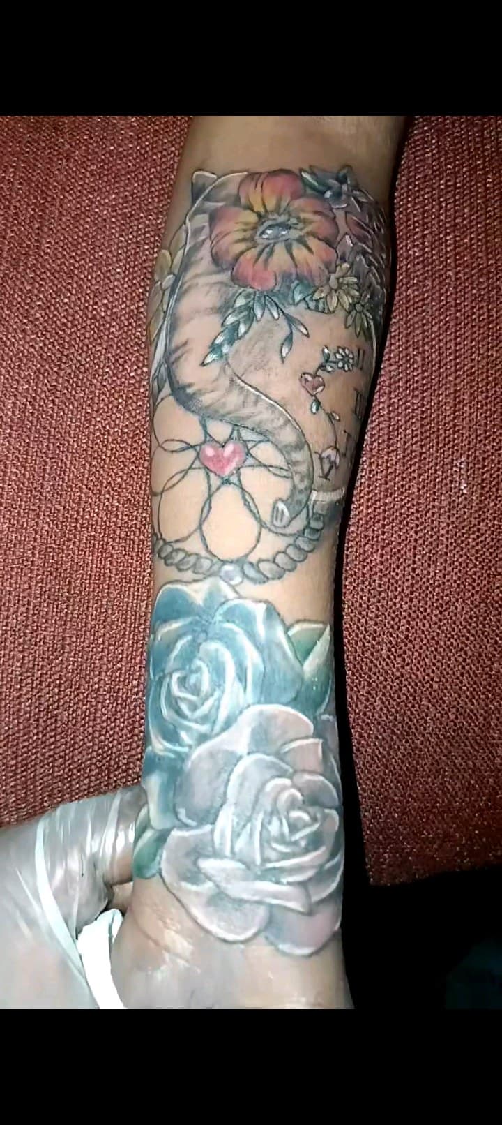 Floral + Color elephant tattoo on Forearm by TattmanW on TattMe
