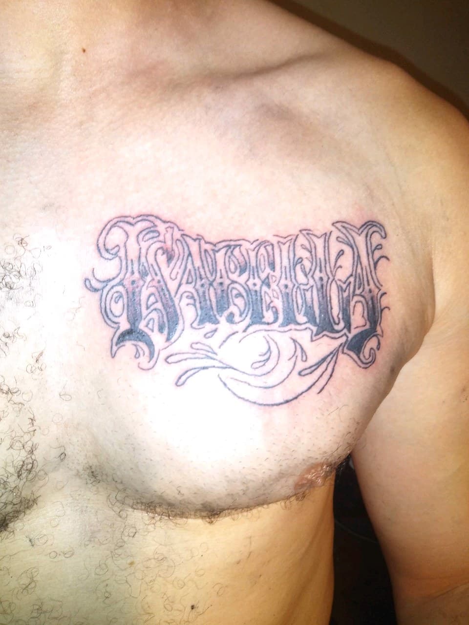 Lettering + Script name tattoo on Chest by TattmanW on TattMe