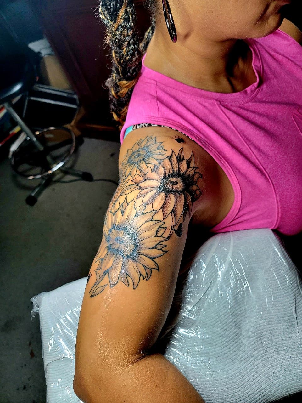 Floral + Black & Grey sunflowers tattoo on Upper Arm by Dank_N_Paint on TattMe