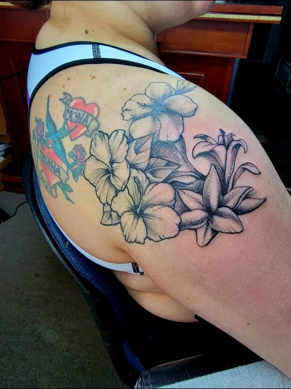 Floral + Black & Grey flowers tattoo on Upper Arm by Dank_N_Paint on TattMe