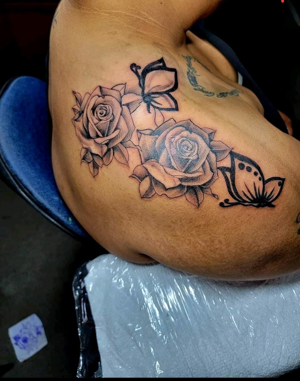 Black & Grey + Illustrative roses tattoo on Shoulder Blade by Dank_N_Paint on TattMe