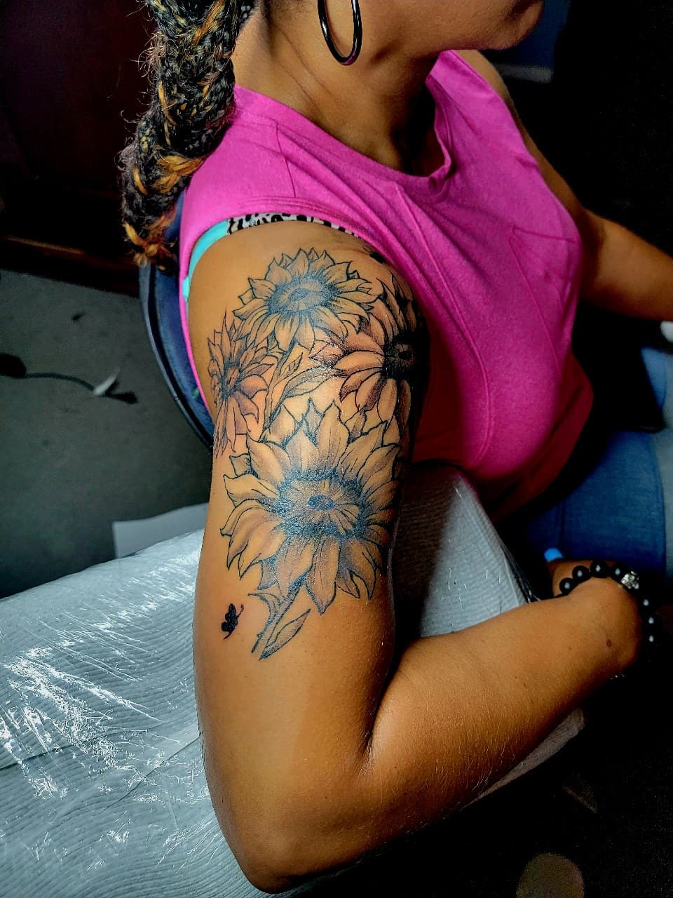 Floral + Black & Grey sunflowers tattoo on Upper Arm by Dank_N_Paint on TattMe